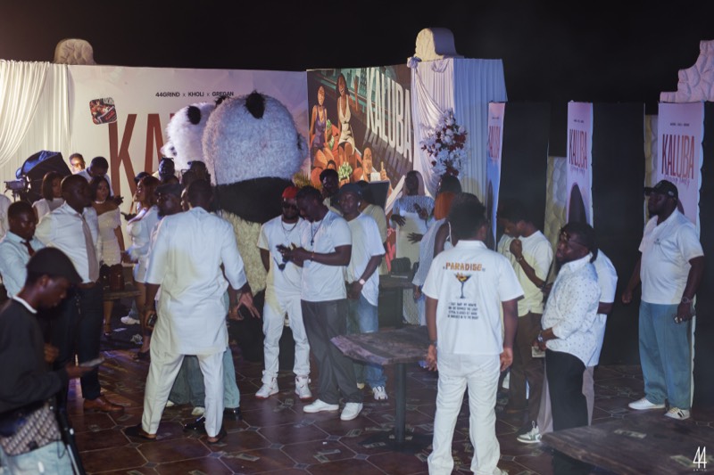 Guests in all white filling the room.