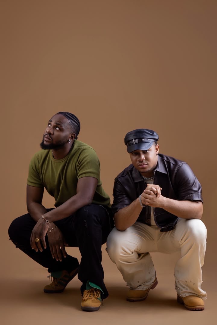Kholi Kabelo and GREGAN photographed together in the studio against a warm brown backdrop.